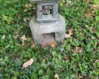 Cement lawn statue