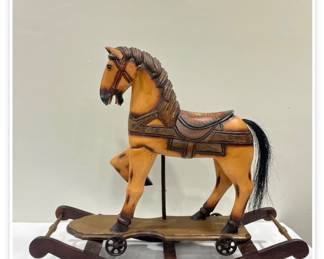 And painted wood carved rocking horse