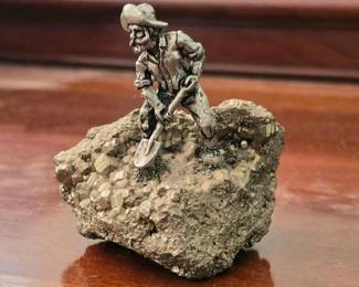 130 minerfigurineonpyriterockbase