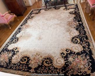 Room-size rug, cream field with black floral scroll border - ships