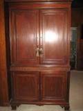 Entertainment center with pocket doors