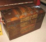 antique round top trunk