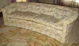 pair of vintage curved Baker sofas
