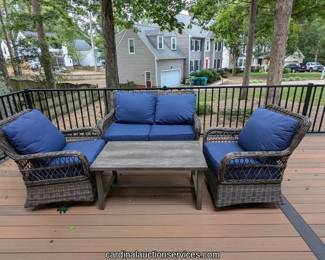 All-weather wicker patio set with swivel rockers, cushions and covers