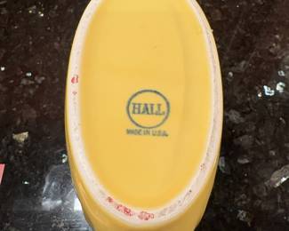 T4 - $20. Hall pottery pitcher in yellow. Measures 8.5" x 8" tall. Excellent condition.