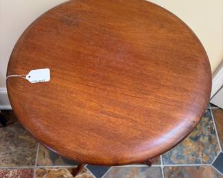 T10 - $95. Art Nouveau Two Tier Table. Measures 18.25" x 29.5" tall. Sturdy with a few minor top scratches.