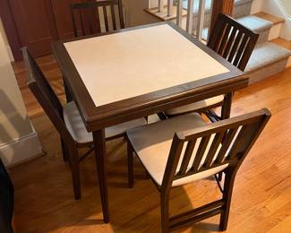 T37 - $125. Stakmore Company Midcentury Folding Bridge Table with 4 folding chairs. Wood frame with Vinyl top and seats. Table measures - 30.5" x 30.5" x 29" Tall. Chairs measure - 16.5" x 19" x 32" tall, floor to seat 17.75". Excellent condition.