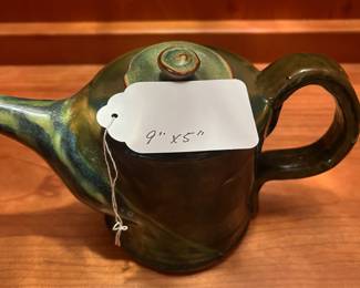 T26 - $20. Unsigned pottery teapot. Measures 9" x 5" tall. Excellent condition.