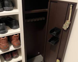 T114 - $150. Homak Keyed Metal Gun Safe. Measures 21" x 10" x 55" tall. Excellent condition.