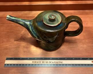 T26 - $20. Unsigned pottery teapot. Measures 9" x 5" tall. Excellent condition.