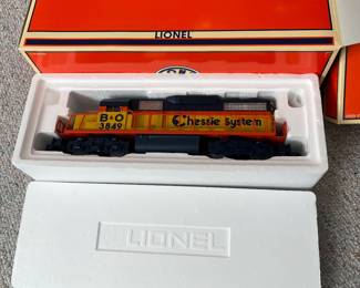 T58 - $165. Lionel 6-31915 Chessie Diesel Freight Set 0-27 Gauge Scale. Looks to be complete. Comes with EXTRA Lionel truck and 2002 Christmas box car 6-36243. Untested.
