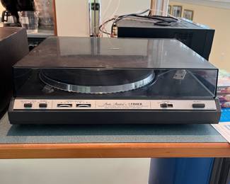 T81 - $120. Fisher Quartz Semi Automatic Stereo Turntable Model MT - 6335. Powers on and turns.