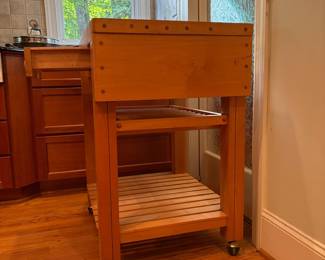 T2 - $150. Butcher Block Rolling Island. Measures 32.25" x 23" x 36" tall. Single drawer slides easily, holes for knives. Overall very good condition.