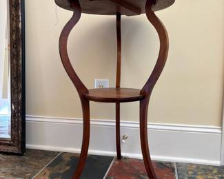 T10 - $95. Art Nouveau Two Tier Table. Measures 18.25" x 29.5" tall. Sturdy with a few minor top scratches.