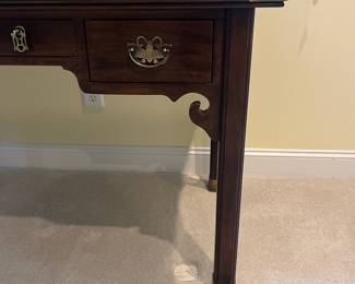 T41 - $550. Henredon Chair and Writing Desk with 3 Drawers and Brass Plated Corners and Feet. Desk Measures - 52" x 25" x 29.5" Tall. Chair- 20" x 18.5" x 43"T, floor to seat 16.5". Overall very good condition, most wear is on one desk leg as seen in photo.