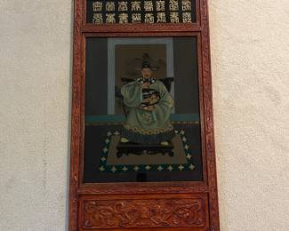 T93 - $750. PAIR of Chinese Ancestor Reverse Paintings on glass with intricately carved wood frame and brass hanging plates. Each Measures 21.75" x 41.5"T. Very good condition.