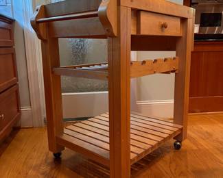 T2 - $150. Butcher Block Rolling Island. Measures 32.25" x 23" x 36" tall. Single drawer slides easily, holes for knives. Overall very good condition.