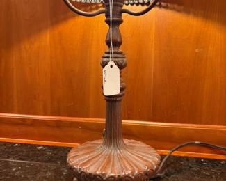 T5 - $125. Quoizel Table Lamp, Tiffany style shade with damage as shown in photo, Dragonfly motif. 18.5" tall.