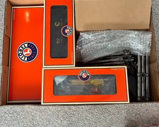 T58 - $165. Lionel 6-31915 Chessie Diesel Freight Set 0-27 Gauge Scale. Looks to be complete. Comes with EXTRA Lionel truck and 2002 Christmas box car 6-36243. Untested.