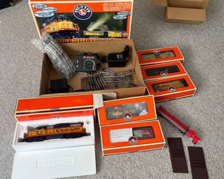 T58 - $165. Lionel 6-31915 Chessie Diesel Freight Set 0-27 Gauge Scale. Looks to be complete. Comes with EXTRA Lionel truck and 2002 Christmas box car 6-36243. Untested.