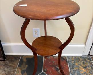 T10 - $95. Art Nouveau Two Tier Table. Measures 18.25" x 29.5" tall. Sturdy with a few minor top scratches.