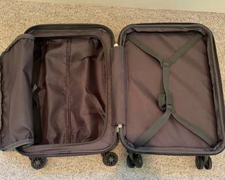 T88 - $55. Delsey Paris Carry On. Measures 22” tall.