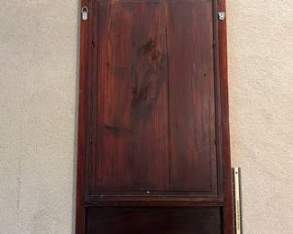 T93 - $750. PAIR of Chinese Ancestor Reverse Paintings on glass with intricately carved wood frame and brass hanging plates. Each Measures 21.75" x 41.5"T. Very good condition.