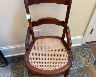 T23 - $40. Single Caned Chair. Measures 17" x 17.5" x 33" Tall. Floor to seat 17". Very good condition, caning excellent condition, chair structurally sound.
