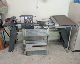 T118 - $150. Shop Smith Lathe model 555483 and Power Station model 555422 with extra parts. Please have help to move.