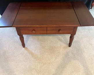 T44 - $60. Wooden Coffee Table with Drop Leaf Sides and 1 drawer. Measures 30" (45" expanded) x 24" x 17" Tall. Very good condition with some surface wear, mainly on legs.