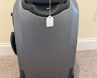 T88 - $25. Delsey Hard Case Carry On Suitcase. Has a lot of wear but clean inside. Measures 21” tall.