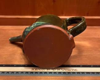 T26 - $20. Unsigned pottery teapot. Measures 9" x 5" tall. Excellent condition.