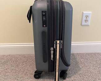T88 - $55. Delsey Paris Carry On. Measures 22” tall.