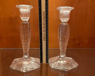 T72 - $25. Vintage Fostoria Floral Etched Candlestick Holders. Measures 8” tall.