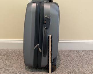 T88 - $25. Delsey Hard Case Carry On Suitcase. Has a lot of wear but clean inside. Measures 21” tall.