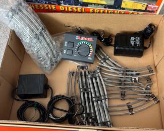 T58 - $165. Lionel 6-31915 Chessie Diesel Freight Set 0-27 Gauge Scale. Looks to be complete. Comes with EXTRA Lionel truck and 2002 Christmas box car 6-36243. Untested.