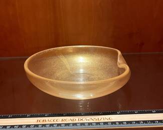 T71 - $65. Elsa Peretti for Tiffany & Co. Gold Leaf Thumbprint Bowl. Measures 7.75” x 2” tall.