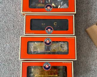 T58 - $165. Lionel 6-31915 Chessie Diesel Freight Set 0-27 Gauge Scale. Looks to be complete. Comes with EXTRA Lionel truck and 2002 Christmas box car 6-36243. Untested.