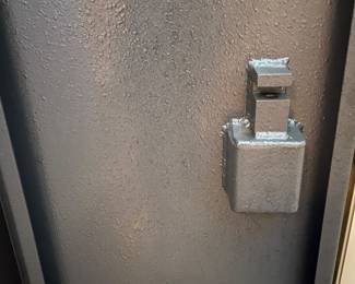 T113 - $75. Metal gun safe with keyed lock. 19.25" x 12" x 60" tall. Excellent condition.