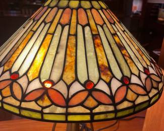T119 - $450. Pair of Quoizel Lamps with Tiffany Style Lamp Shades. One lamp has a small chip but both are in great condition. Both lamp shades are in excellent condition with no chips or cracks noticed.