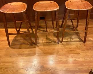 T36 - $900 FIRM. Michael Seward set of 3 Wood Stools. Measures 17.75" x 15.5" x 30" Tall. Very good condition with minor scratches.