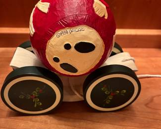 T123 - $120. Pair of Vintage Christmas 1988 BRIERE Mrs. Claus and 1986 Santa Folk Art Pull Toys. Each measures 7.25” x 6.5“ tall.
