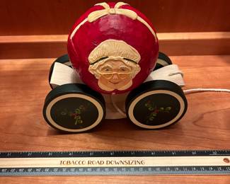 T123 - $120. Pair of Vintage Christmas 1988 BRIERE Mrs. Claus and 1986 Santa Folk Art Pull Toys. Each measures 7.25” x 6.5“ tall.