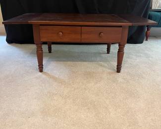 T44 - $60. Wooden Coffee Table with Drop Leaf Sides and 1 drawer. Measures 30" (45" expanded) x 24" x 17" Tall. Very good condition with some surface wear, mainly on legs.