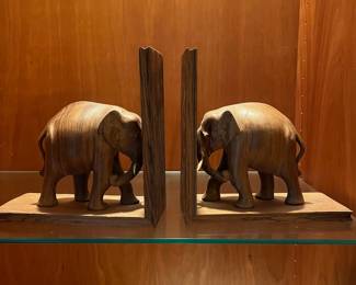 T54 - $30. Pair of Hand Carved Wood Elephant Bookends. Measures 8" x 8" tall. Excellent condition.