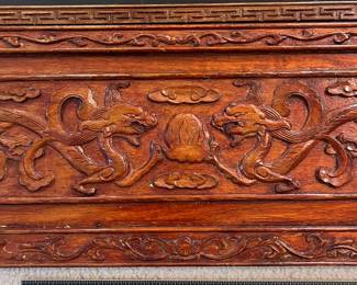 T93 - $750. PAIR of Chinese Ancestor Reverse Paintings on glass with intricately carved wood frame and brass hanging plates. Each Measures 21.75" x 41.5"T. Very good condition.