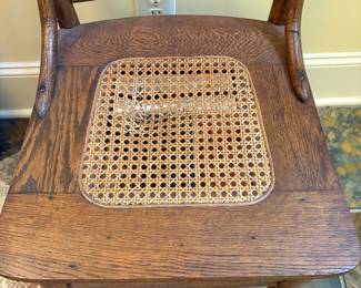 T20 - $30. Antique Caned Chair. Caning needs replaced. Measures 17" x 17" x 38" tall. Floor to seat 17.5". Structurally in very good condition.