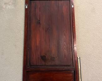 T93 - $750. PAIR of Chinese Ancestor Reverse Paintings on glass with intricately carved wood frame and brass hanging plates. Each Measures 21.75" x 41.5"T. Very good condition.