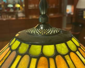 T119 - $450. Pair of Quoizel Lamps with Tiffany Style Lamp Shades. One lamp has a small chip but both are in great condition. Both lamp shades are in excellent condition with no chips or cracks noticed.