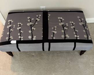 T51 - $20. Safavieh Upholstered Bench with Wood Legs. Measures 47" x 26.5" x 15.5" tall. Upholstery has some staining and legs are wobbly.